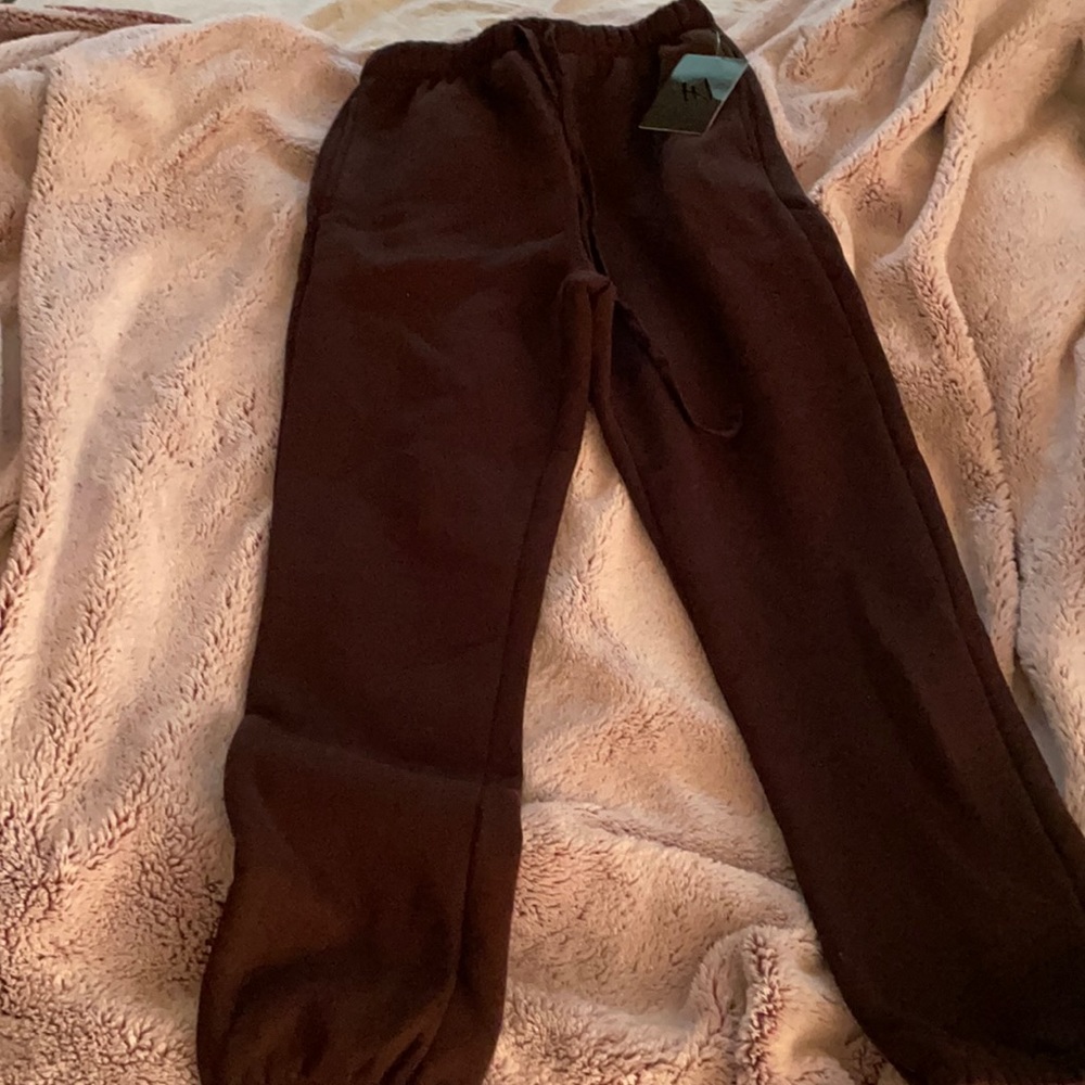 Lori Harvey Naked Wardrobe joggers dark chocolate